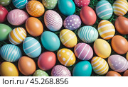 Group of colorful easter eggs laid on blanket. Multi colored easter eggs against bright wool blanket background. Concept of family traditions, Pascha, Resurrection Sunday, Christian cultural holiday. Стоковое AI-изображение, AI-художник Sergey Grishin / Фотобанк Лори