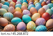 Group of colorful easter eggs laid on blanket. Multi colored easter eggs against bright wool blanket background. Concept of family traditions, Pascha, Resurrection Sunday, Christian cultural holiday. Стоковое AI-изображение, AI-художник Sergey Grishin / Фотобанк Лори