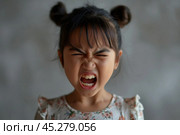 Portrait of angry emotional Asian girl screaming and frustrated shouting with anger, crazy and yelling on white background, Concept of attention deficit hyperactivity disorder (ADHD) Стоковое AI-изображение, AI-художник Sergey Grishin / Фотобанк Лори