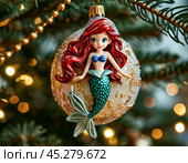 Cute Little Mermaid on the Christmas tree, bright Christmas tree toy. New Year's decor. Festive New Year's atmosphere. Стоковое AI-изображение, AI-художник Сергей Елизарьев / Фотобанк Лори