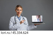 Female doctor, healthcare professional demonstrating data on laptop screen, modern medical consultation online, doctor with computer technology for patient care, virtual health services. Стоковое AI-изображение, AI-художник Павел Муравьев / Фотобанк Лори