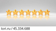 Seven golden stars on reflective surface, highest quality rating, award for exceptional service, customer satisfaction symbol, premium choice, luxury status, perfect score, achievement of excellence. Стоковое фото, фотограф Павел Муравьев / Фотобанк Лори