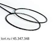 Badminton rackets on white. Стоковое фото, фотограф Сергей Толмачёв / Фотобанк Лори