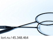 Badminton rackets on white. Стоковое фото, фотограф Сергей Толмачёв / Фотобанк Лори