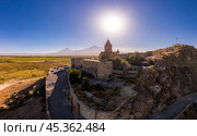Aerial view of Armenian Khor Virap Monastery against Ararat Mount on sunny summer evning. Ancient church most popular touristic destinations during sunset. Dramatic landscape. Armenia, Europe. Стоковое фото, фотограф Алексей Ширманов / Фотобанк Лори