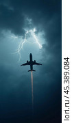 The aircraft encounters a severe thunderstorm, surrounded by dark clouds and illuminated by bright lightning strikes, highlighting the danger in the sky. Causes of air crashes. Generative AI. Стоковое AI-изображение, AI-художник Юлия Петровская / Фотобанк Лори
