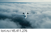 Роскошный частный бизнес-джет VIP-класса парит в небе над пушистыми облаками и величественными горами внизу. Стоковое AI-изображение, AI-художник ФотоИнтеллект / Фотобанк Лори