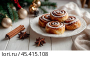 The cinnabons. Close-up of cinnamon buns. Beautiful buns with fresh cinnamon and icing on a wooden table. Fragrant homemade New Year's pastries. Стоковое AI-изображение, AI-художник Photojuli / Фотобанк Лори