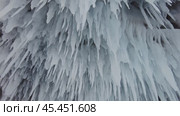 Ice cave on Baikal lake in winter. Стоковое видео, видеограф Михаил Коханчиков / Фотобанк Лори
