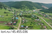 Южный Урал, Башкирия, село Ташла. Вид с воздуха. Southern Urals, Bashkiria, Tashla village. Aerial view. (2024 год). Стоковое видео, видеограф Евгений Романов / Фотобанк Лори