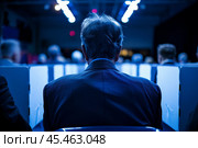 Chairman of the Election Commission looking for Election workers count ballots at a polling station, ensuring the accurate tally of votes in elections. Election fraud dangerous. Стоковое AI-изображение, AI-художник Sergey Grishin / Фотобанк Лори