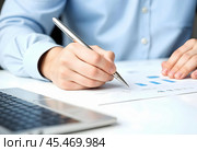 A businessman works with documents. Стоковое AI-изображение, AI-художник RamA / Фотобанк Лори