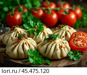 Khinkali with a spicy eggplant filling. Enjoy your meal! Стоковое AI-изображение, AI-художник Сергей Елизарьев / Фотобанк Лори