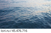 Azure Adriatic Mediterranean Sea. Blue water surface. Travel, boat trips, summer holidays, tourism Montenegro, Bar region. Calm bottomless sea. Travel beach holidays. Aqua ripples. Water background. Стоковое видео, видеограф Юлия Петровская / Фотобанк Лори