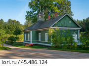 Building of the Colony of elderly Teachers and writers on the territory of the Mikhailovskoye estate of the Pushkin Museum-Reserve on a summer day, Pushkinskiye Gory, Pskov Oblast, Russia. Редакционное фото, фотограф Ula Ulachka / Фотобанк Лори