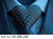 Father's Day concept. Heart shaped blue necktie on pastel blue background with copyspace for text. Стоковое AI-изображение, AI-художник Ирина Михайличенко / Фотобанк Лори