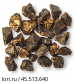 Raw myrrh resin chunks on white background. Стоковое AI-изображение, AI-художник Иван Рябоконь / Фотобанк Лори