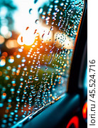 Raindrops cling to the surface of car glass, distorting a vibrant cityscape at evening, where colorful lights from traffic and buildings merge into a beautiful display. Generative AI. Стоковое AI-изображение, AI-художник Юлия Петровская / Фотобанк Лори