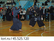 Nizhny Novgorod, Russia, 11.24.2024 Gagarin Avenue 25 d Russian Kendo Championship. Athletes in protective equipment with a sword and a protective helmet at competitions. Редакционное фото, фотограф Egor Sarantstv / Фотобанк Лори