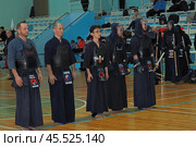 Nizhny Novgorod, Russia, 11.24.2024 Gagarin Avenue 25 d Russian Kendo Championship. Athletes in protective equipment with a sword and a protective helmet at competitions. Редакционное фото, фотограф Egor Sarantstv / Фотобанк Лори