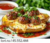 Potato boats with meatballs and cheese are an original and tasty dish that can be served as a main course on a festive or everyday table. Стоковое AI-изображение, AI-художник Сергей Елизарьев / Фотобанк Лори