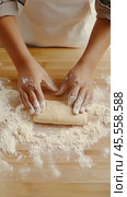 Close-up of artisan dough rolling in the kitchen for culinary creations. Стоковое AI-изображение, AI-художник Sabyna75 / Фотобанк Лори