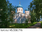 View of the Cross Exaltation Cathedral of St. George (Yuryev) Monastery on a sunny summer day, Veliky Novgorod, Russia. Стоковое фото, фотограф Ula Ulachka / Фотобанк Лори