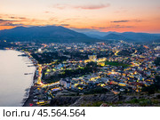 Beautiful view of the night embankment of the city of Sudak after sunset. South coast of the Crimean peninsula. Russia. Стоковое фото, фотограф Константин Лабунский / Фотобанк Лори