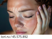 Portrait of beautiful young woman close up with closed eyes experiencing pain. Стоковое AI-изображение, AI-художник Евгений Харитонов / Фотобанк Лори