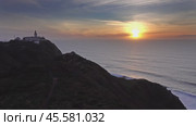 Lighthouse at Cape Roca at sunset in Portugal (2019 год). Стоковое видео, видеограф Михаил Коханчиков / Фотобанк Лори