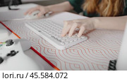 Woman hands operate computer mouse close-up. Copywriter fingers typing text on wireless keyboard in office. Unknown girl gamer pressing buttons, giving commands to players. Technology concept. Стоковое видео, видеограф Енваев Андрей / Фотобанк Лори