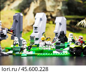 RUSSIA, April 17, 2018. Constructor Lego Star Wars. Squad of stormtroopers and Darth Vader on Easter Island. Редакционное фото, фотограф Андрей Аркуша / Фотобанк Лори