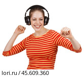 Girl listening to music on headphones. Стоковое фото, фотограф Дмитрий Киселёв / Фотобанк Лори