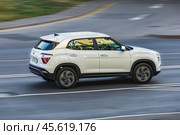 Hyundai Creta 2021 Car is driving on the street. Hyundai IX25 compact suv in motion, rear side view. Редакционное фото, фотограф Константин Григорьев / Фотобанк Лори