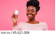 The girl advertises Biologically active additives, medicines. A white jar is in the young woman's hand. Стоковое AI-изображение, AI-художник Ирина Ручушкина / Фотобанк Лори