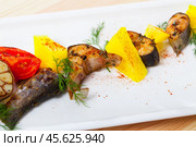 Trout steaks baked with potatoes, tomatoes, garlic. Стоковое фото, фотограф Яков Филимонов / Фотобанк Лори