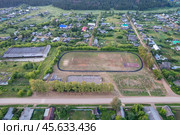 Стадион в Унях (Кировская область) - съемка с дрона (2024 год). Стоковое фото, фотограф Владислав Самошкин / Фотобанк Лори
