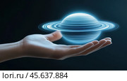 Hand holding a glowing, digital representation of a planet with rings, symbolizing futuristic technology and innovation, AI. Стоковое AI-изображение, AI-художник Сергей Старуш / Фотобанк Лори
