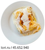 Traditional Cannelloni stuffed with minced meat baked in bechamel sauce with grated cheese. Стоковое фото, фотограф Яков Филимонов / Фотобанк Лори