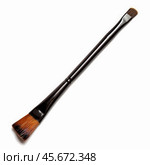 Professional makeup brush with angled bristles for precise application on white background. Стоковое AI-изображение, AI-художник Иван Рябоконь / Фотобанк Лори