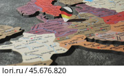 Germany - Travel concept with green pushpin on the world map. The location point on the map points to Berlin, the capital of the German. Стоковое видео, видеограф Андрей Армягов / Фотобанк Лори