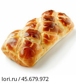 Braided brioche bread loaf resting on white background. Стоковое AI-изображение, AI-художник Иван Рябоконь / Фотобанк Лори