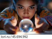 Gypsy fortune teller peers into a glass ball. Стоковое AI-изображение, AI-художник Евгений Харитонов / Фотобанк Лори