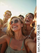 A group of friends smiles and laughs as they soak up the sun by the ocean, creating unforgettable memories during their summer travel adventure. Generative AI. Стоковое AI-изображение, AI-художник Юлия Петровская / Фотобанк Лори