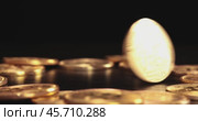 Gold Bit Coin BTC Cryptocurrency Coins on a black background. Bitcoin is a worldwide cryptocurrency and digital payment system called the first decentralized digital currency. Стоковое видео, видеограф Андрей Армягов / Фотобанк Лори