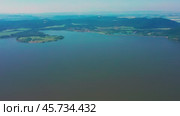 Южный Урал, Башкортостан, Нугушское водохранилище летом. Вид с воздуха. Southern Urals, Bashkortostan, Nugush reservoir in summer. Aerial view. Стоковое видео, видеограф Евгений Романов / Фотобанк Лори