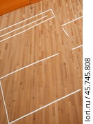 Professional volleyball courts with white lines, nobody. Crop photo of orange volleyball court in sport gym, sporty backdrop. Team game success, healthy sporty lifestyle concept. Copy ad text space. Стоковое AI-изображение, AI-художник Aleksandr Golubev / Фотобанк Лори