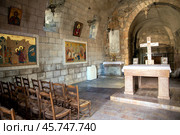 Interior of catholic church Apostle Paul in the city of Damascus. Stone cross, frescoes and icons. Republic of Syria. Стоковое фото, фотограф Евгений Ткачёв / Фотобанк Лори