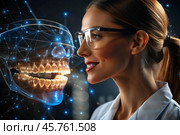 New digital artificial intelligence technologies in dental prosthetics. Implants. A female dentist with a perfect smile and digital dental graphics on a virtual screen. The concept of dental health and dental care. Стоковое AI-изображение, AI-художник Photojuli / Фотобанк Лори