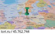 Germany - Travel concept with green pushpin on the world map. The location point on the map points to Berlin, the capital of the German. Стоковое видео, видеограф Андрей Армягов / Фотобанк Лори